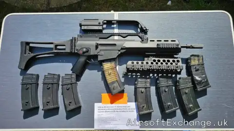 SRC - G36k With mosfet, uprated gears, folding Stock, real steel handguard & 8 Magazines